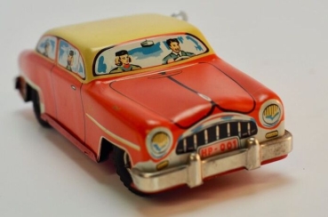 HPZ Prottengeier Sedan with driver 1955 Tinmodel with frictiondrive in original box (5694)